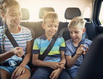 Kids Playing Games in Car