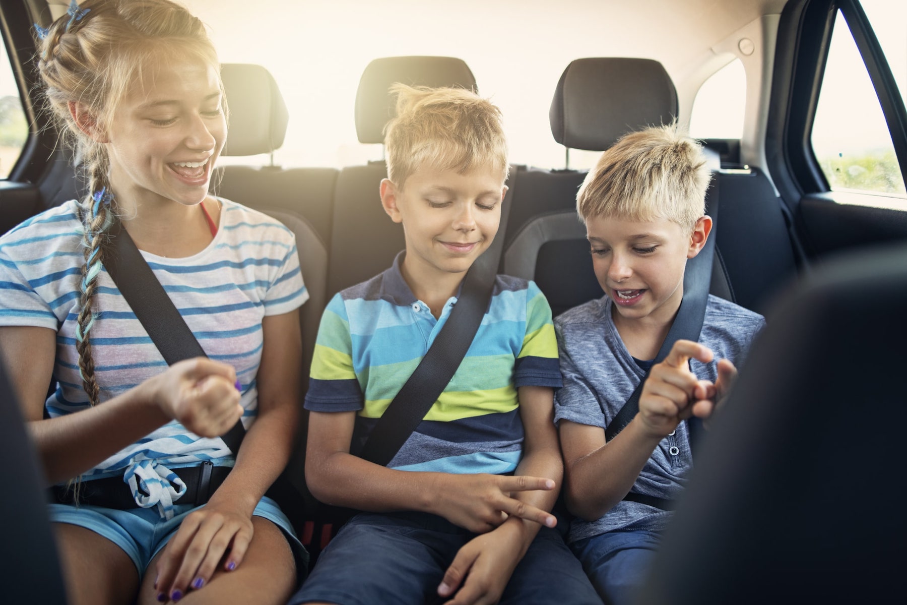 Kids Playing Games in Car